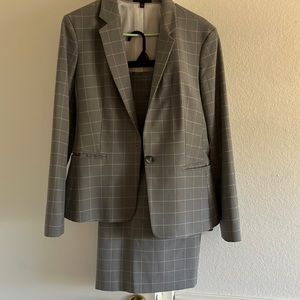 Express two piece woman’s suit jacket size 12 skirt size 10